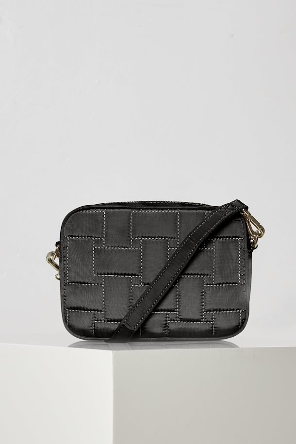 black quilted travel bag